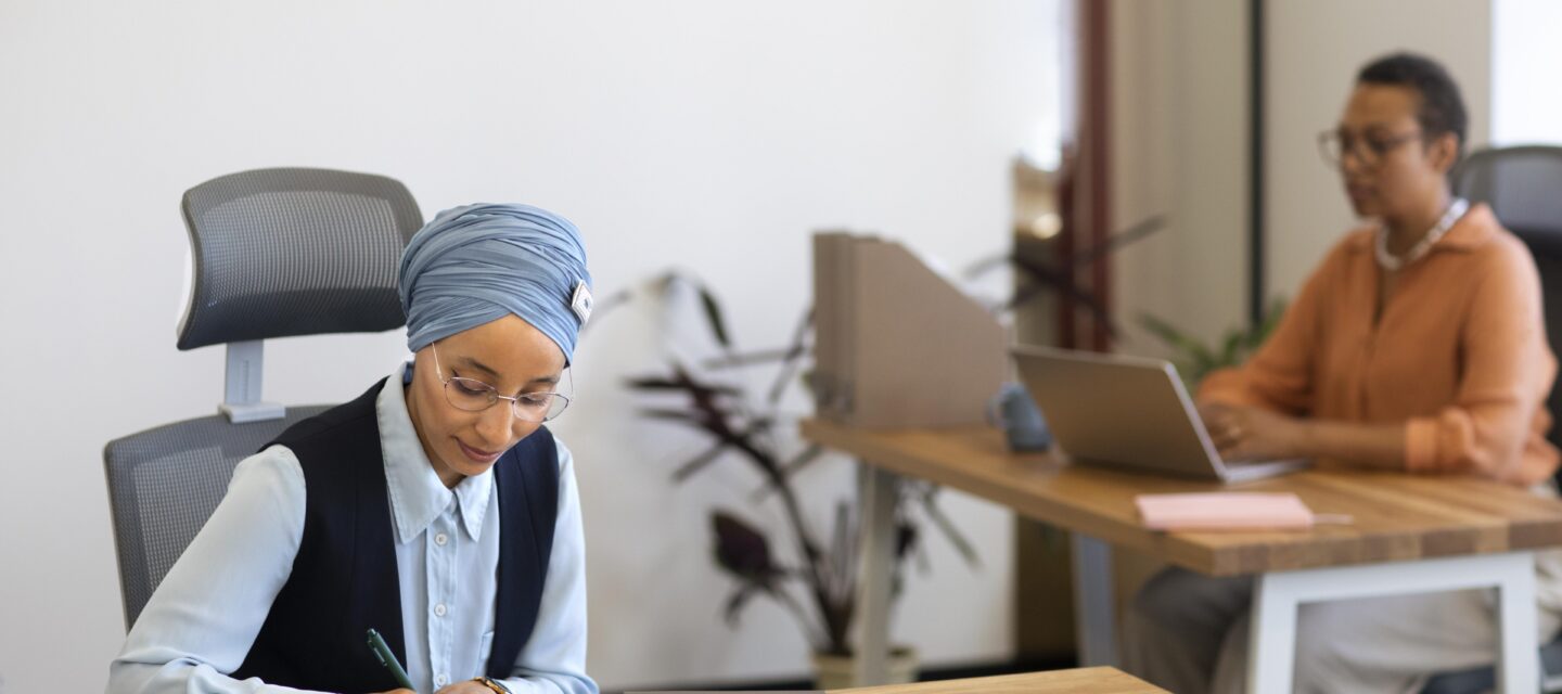 HR professionals managing people operations in an office